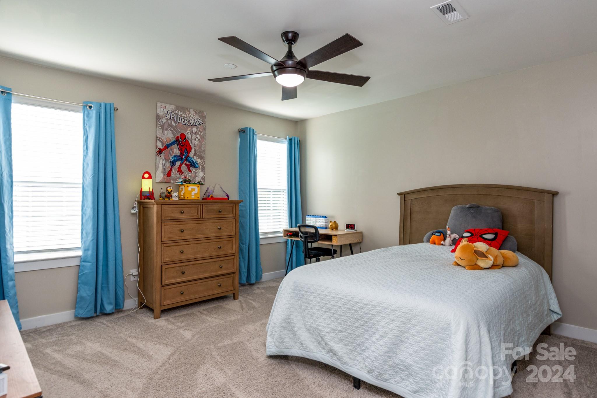 14306 Sunnyhill Grove Road Davidson, NC 28036 - Photo 21 of 35 a bedroom with a bed and a window