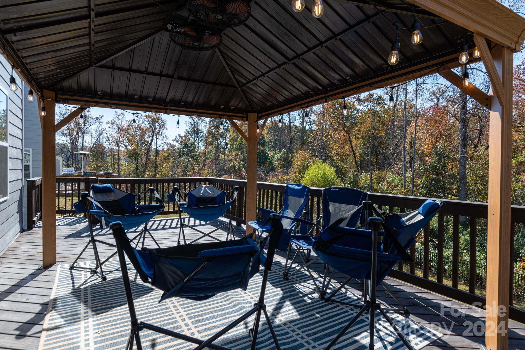 14306 Sunnyhill Grove Road Davidson, NC 28036 - Photo 33 of 35 a view of a two chairs and table in the balcony