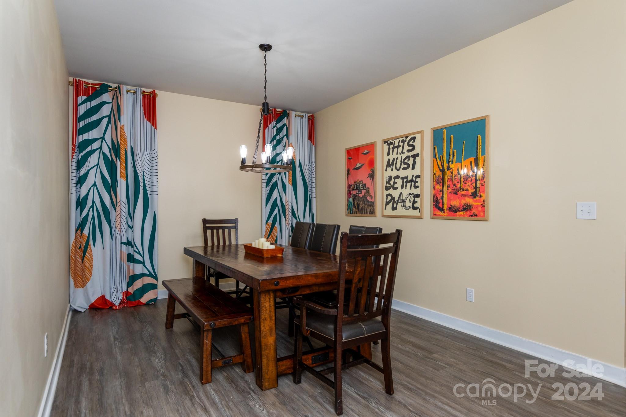 14306 Sunnyhill Grove Road Davidson, NC 28036 - Photo 9 of 35 a view of a dining room with furniture and wooden floor