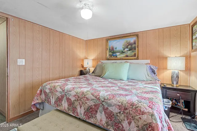 a balcony with chairs and a table