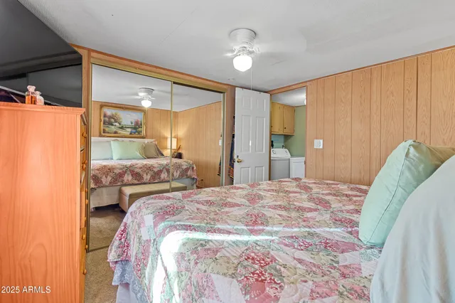 a very nice looking room with wooden floor and furniture