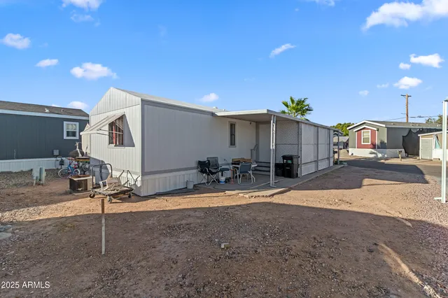 an aerial view of a house with a swimming pool