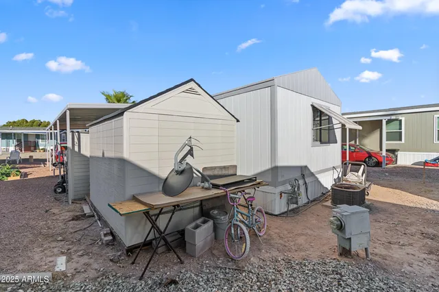 a bathroom with a sink mirror and window