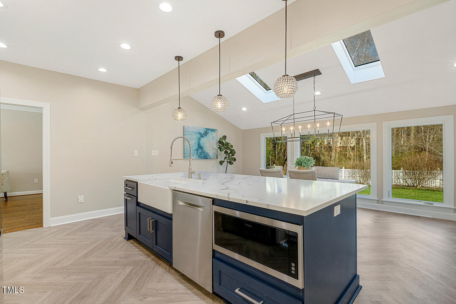 6320 Bayswater Trail Raleigh, NC 27612 - Photo 13 of 62 a kitchen with a stove and a view of hallway