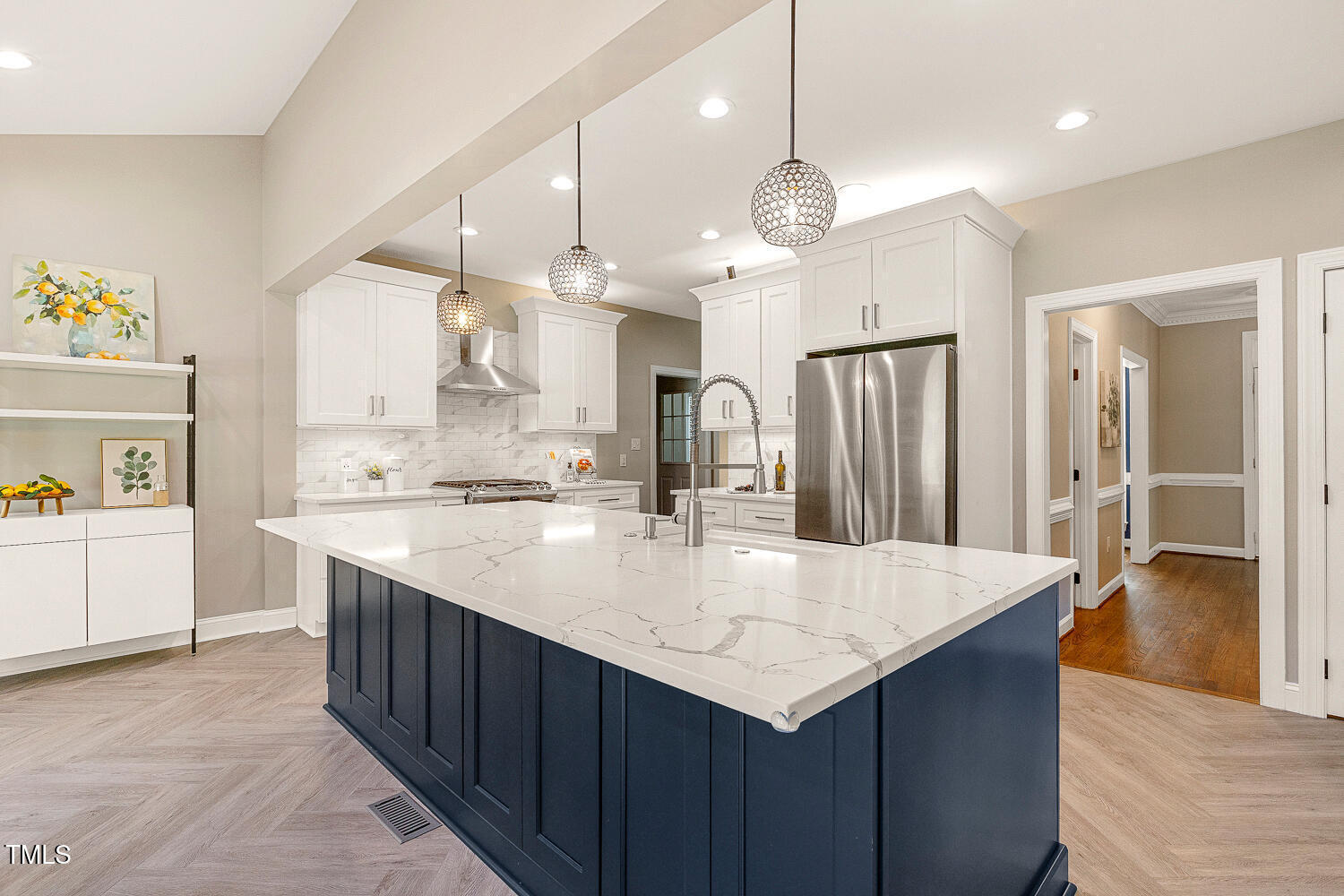 6320 Bayswater Trail Raleigh, NC 27612 - Photo 15 of 62 a large kitchen with a center island wooden floor cabinets and appliances