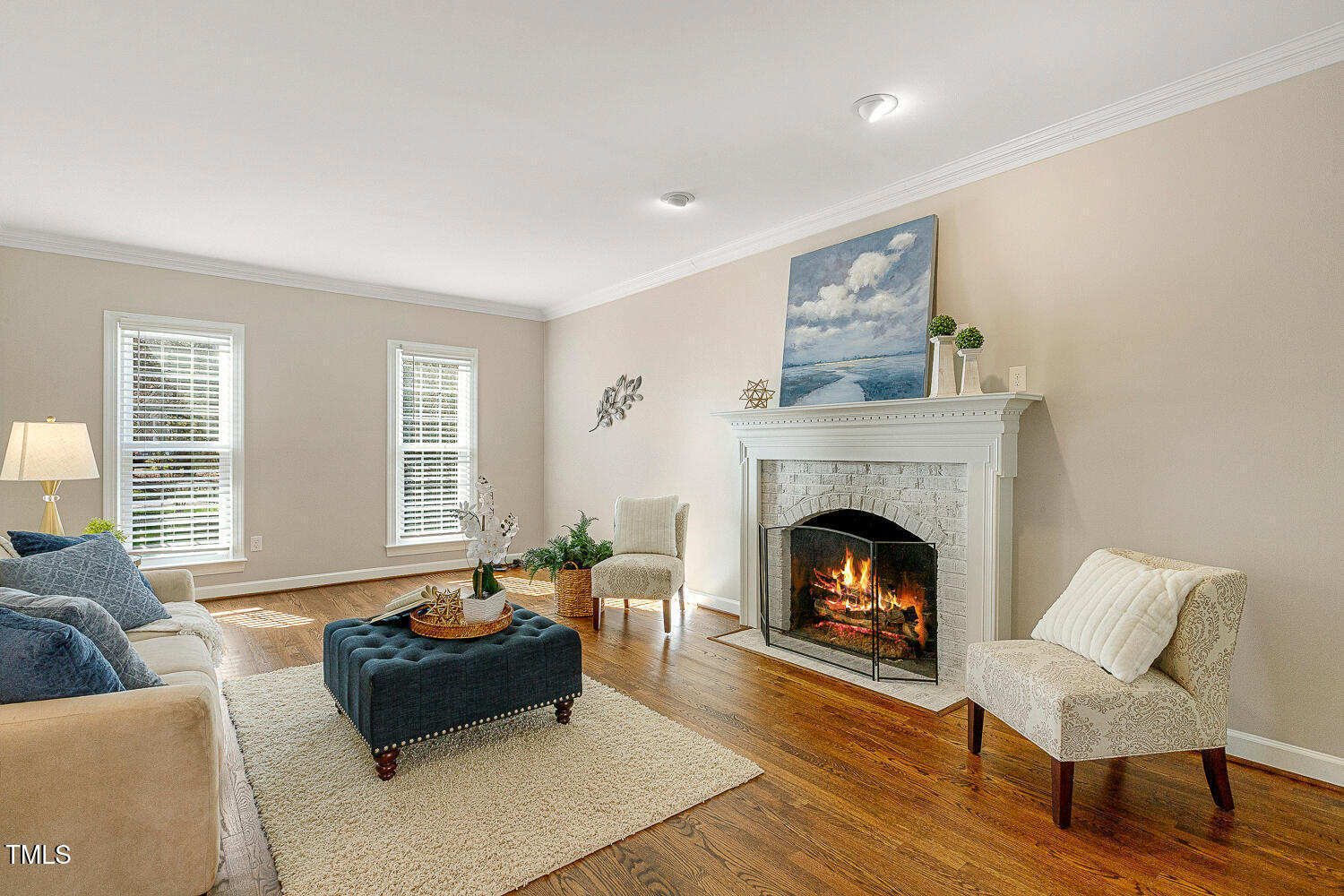 6320 Bayswater Trail Raleigh, NC 27612 - Photo 22 of 62 a living room with furniture and a fireplace