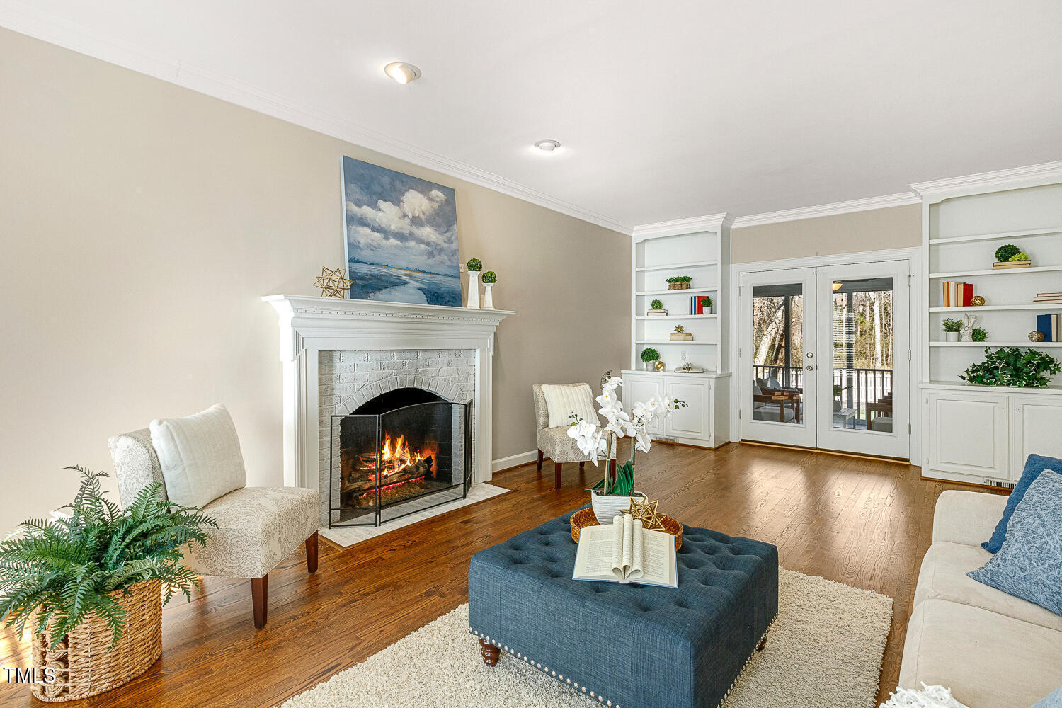 6320 Bayswater Trail Raleigh, NC 27612 - Photo 23 of 62 a living room with furniture and a fireplace