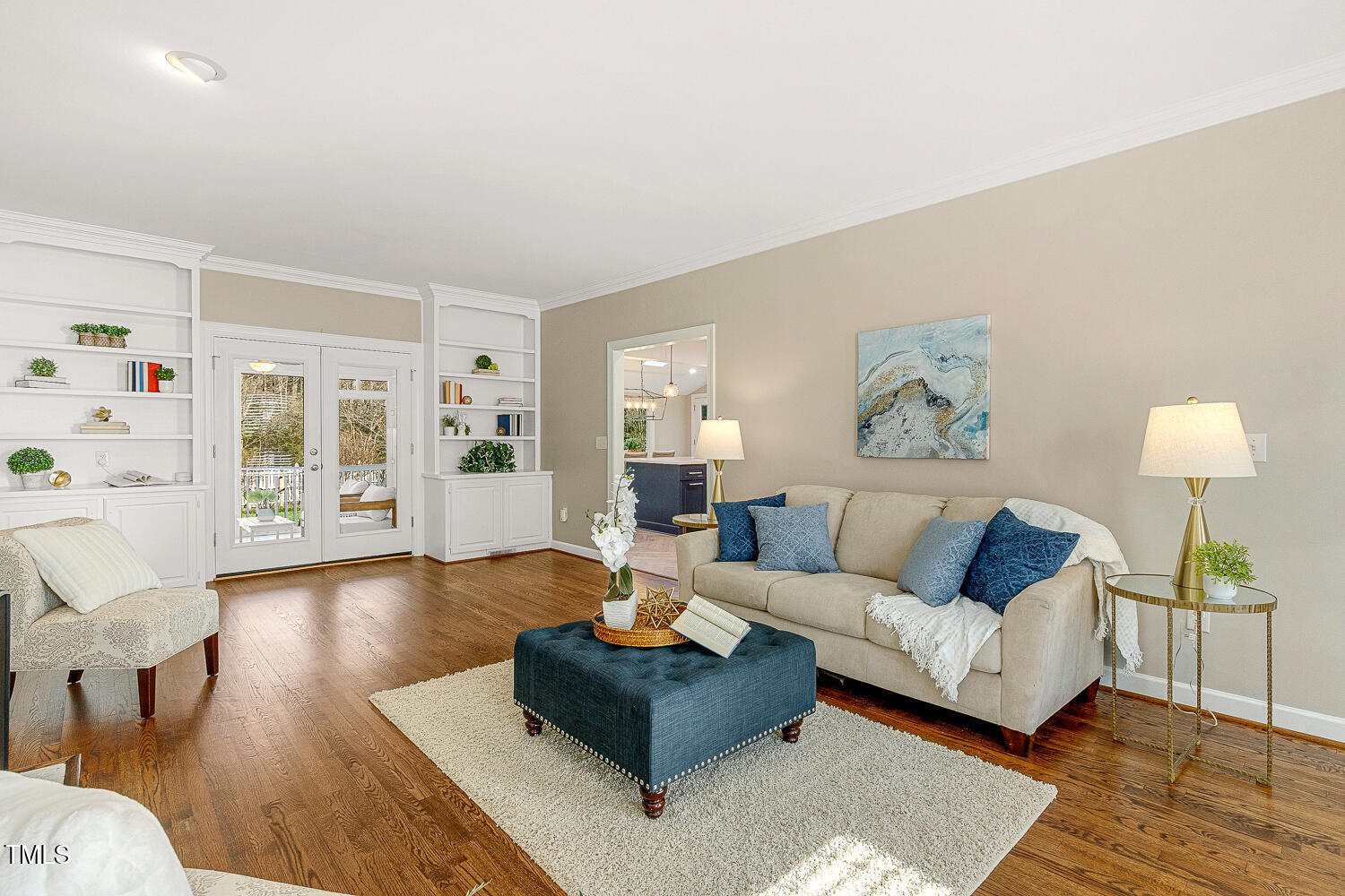 6320 Bayswater Trail Raleigh, NC 27612 - Photo 24 of 62 a living room with furniture and a wooden floor
