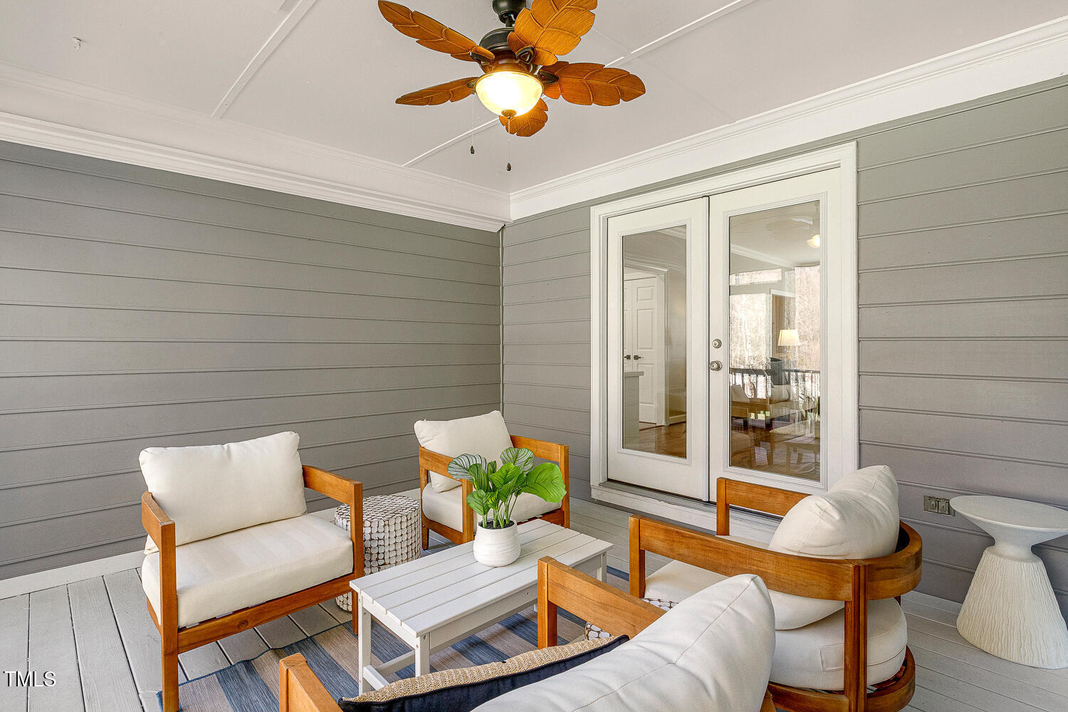 6320 Bayswater Trail Raleigh, NC 27612 - Photo 27 of 62 a living room with furniture and a potted plant