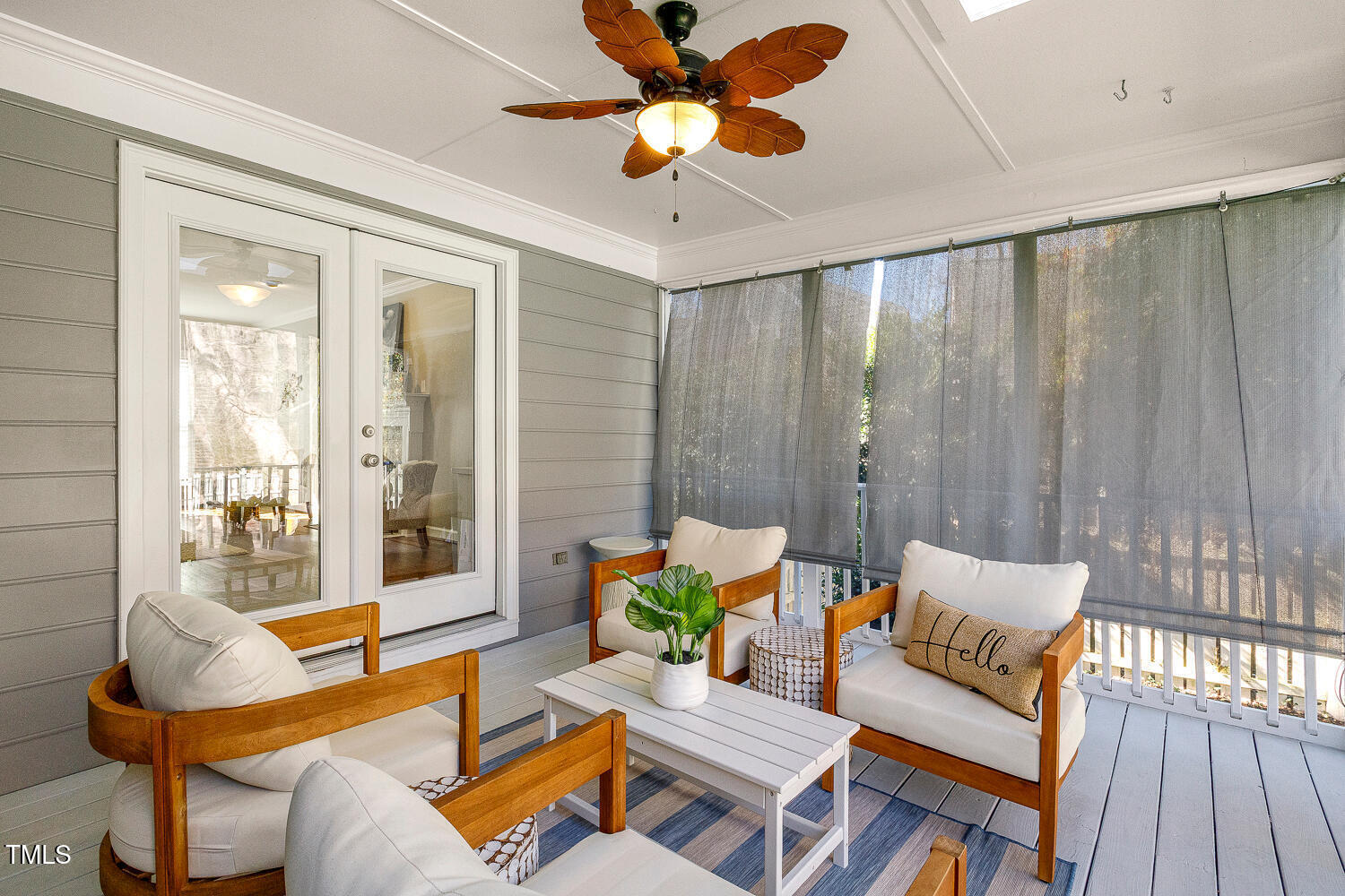 6320 Bayswater Trail Raleigh, NC 27612 - Photo 28 of 62 a living room with furniture and a floor to ceiling window