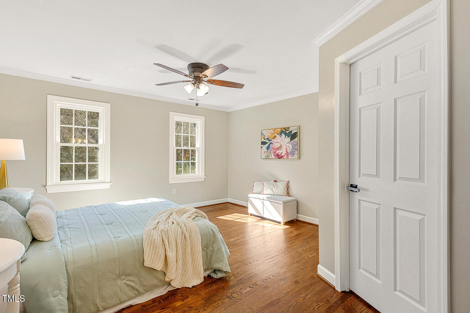 6320 Bayswater Trail Raleigh, NC 27612 - Photo 34 of 62 a bedroom with a bed and wooden floor