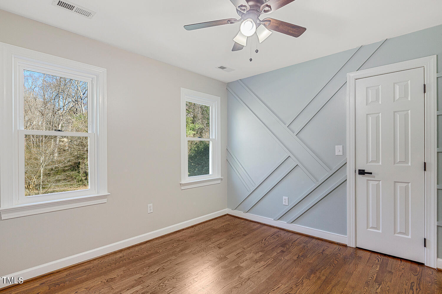 6320 Bayswater Trail Raleigh, NC 27612 - Photo 41 of 62 a view of an entryway with wooden floor and cabinet