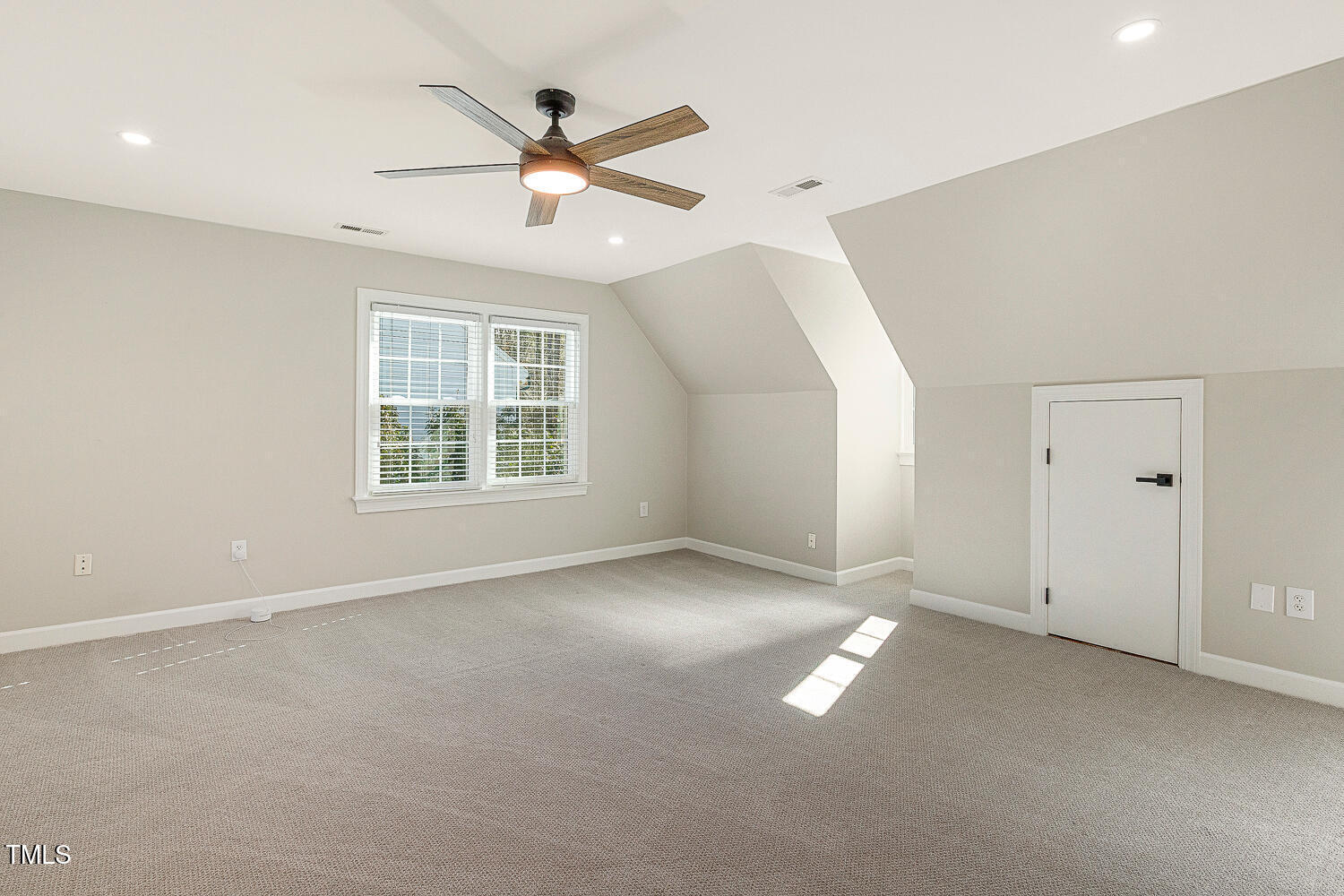 6320 Bayswater Trail Raleigh, NC 27612 - Photo 47 of 62 a view of an empty room with a window