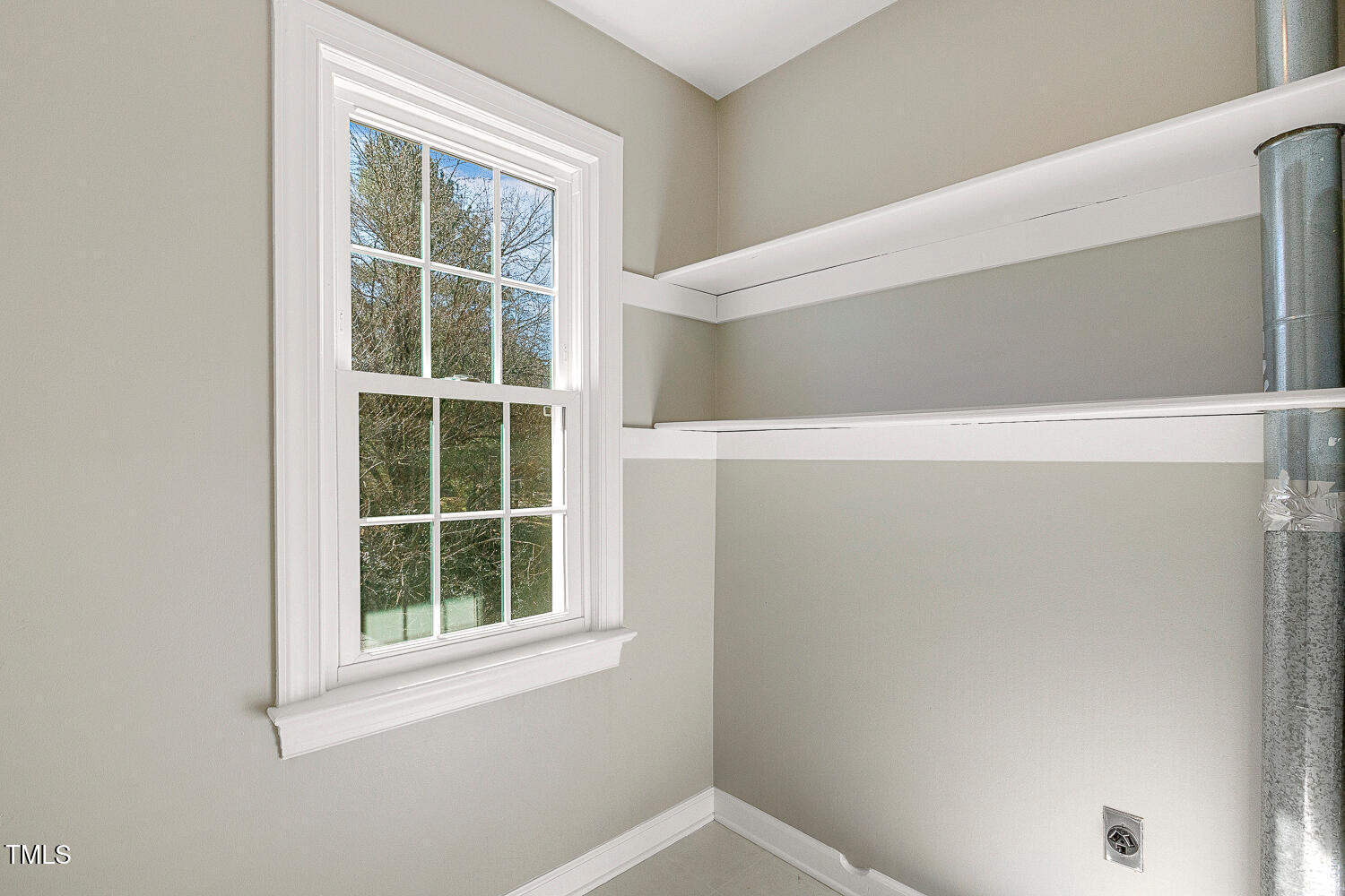6320 Bayswater Trail Raleigh, NC 27612 - Photo 50 of 62 a view of an empty room with a window
