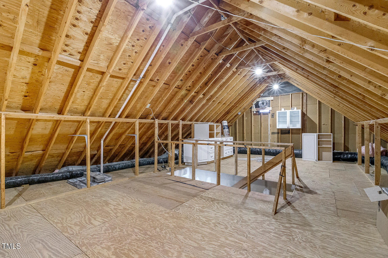 6320 Bayswater Trail Raleigh, NC 27612 - Photo 51 of 62 a view of a room with wooden floor