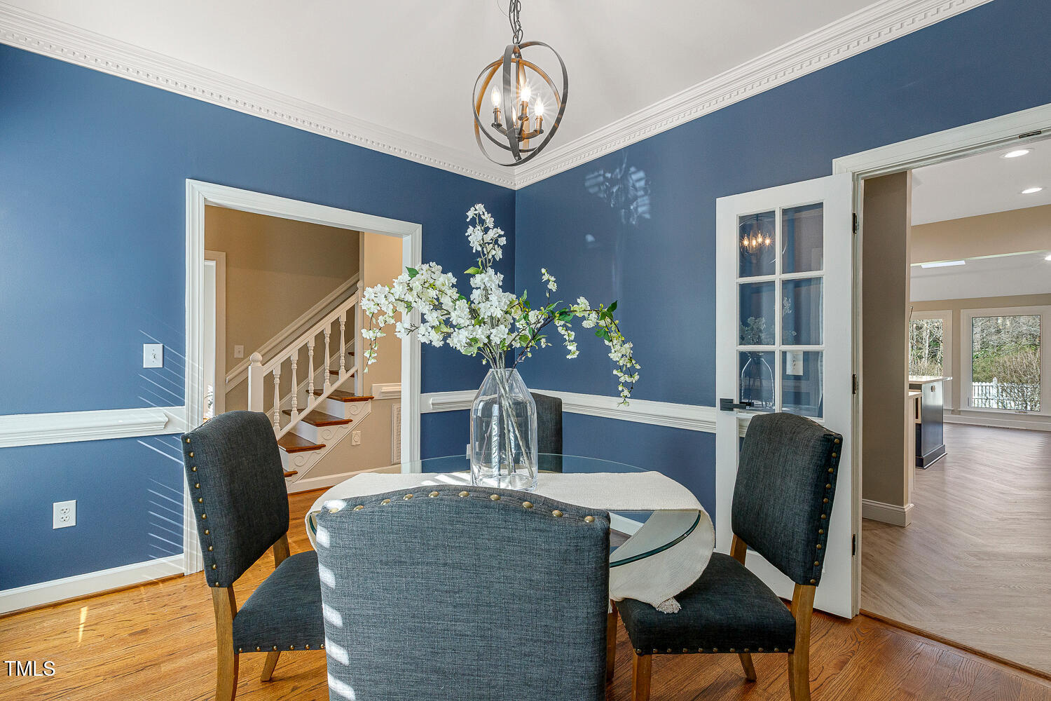 6320 Bayswater Trail Raleigh, NC 27612 - Photo 8 of 62 a view of a dining room with furniture and wooden floor