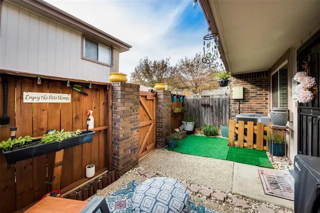 a view of dinning table and chairs in patio