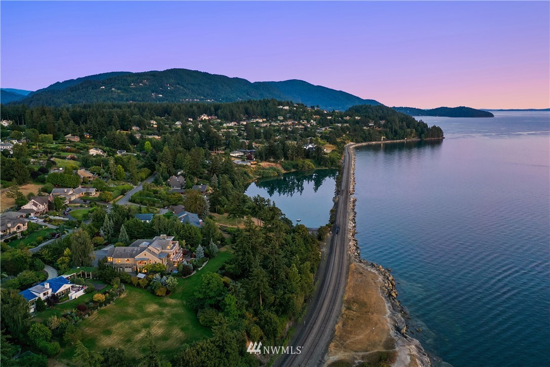 334 Bayside Road Bellingham, WA 98225 - Photo 40 of 40 a view of a lake with a mountain in the background