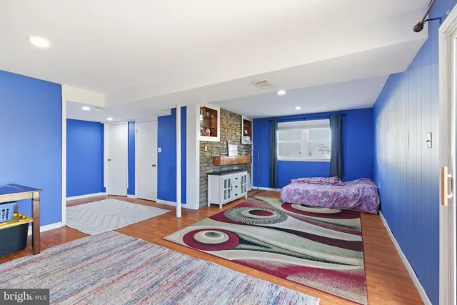 a bedroom with a bed and a closet