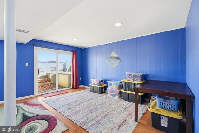 a bed room with a bed and mirror