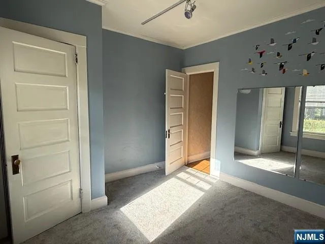 wooden floor and window in a room