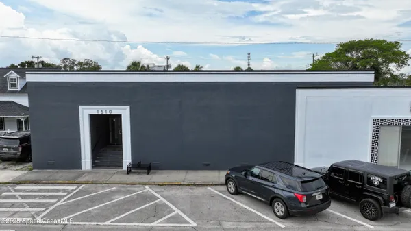 a car parked in front of a building
