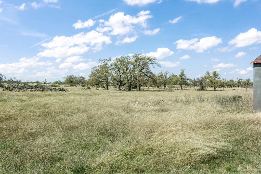 3527 Old Harper Road Fredericksburg, TX 78624 - Photo 22 of 41 a view of a lake with houses in the background