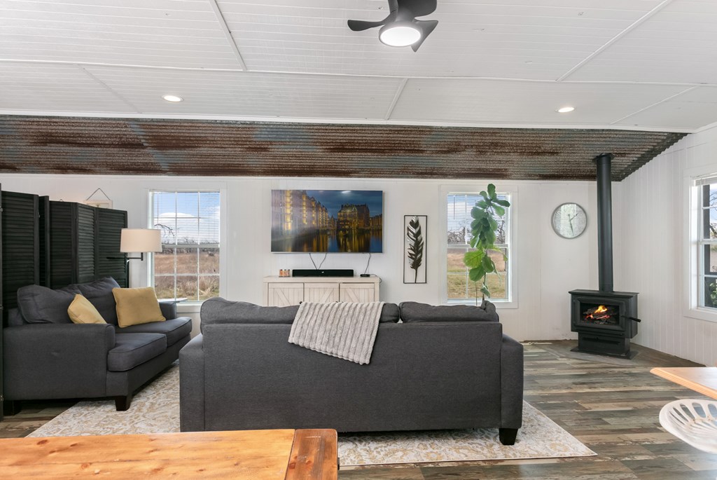 3527 Old Harper Road Fredericksburg, TX 78624 - Photo 8 of 41 a living room with furniture and a flat screen tv