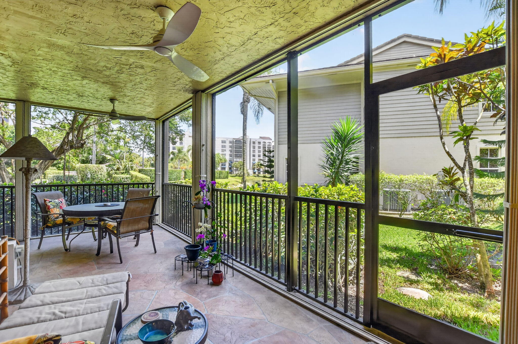 7590 Elm Ridge Drive Boca Raton, FL 33433 - Photo 32 of 46 Wrap around patio