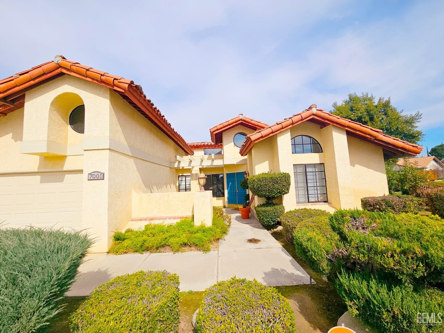Undisclosed Address Bakersfield, CA 93309 - Photo 28 of 28 a front view of a house with a yard