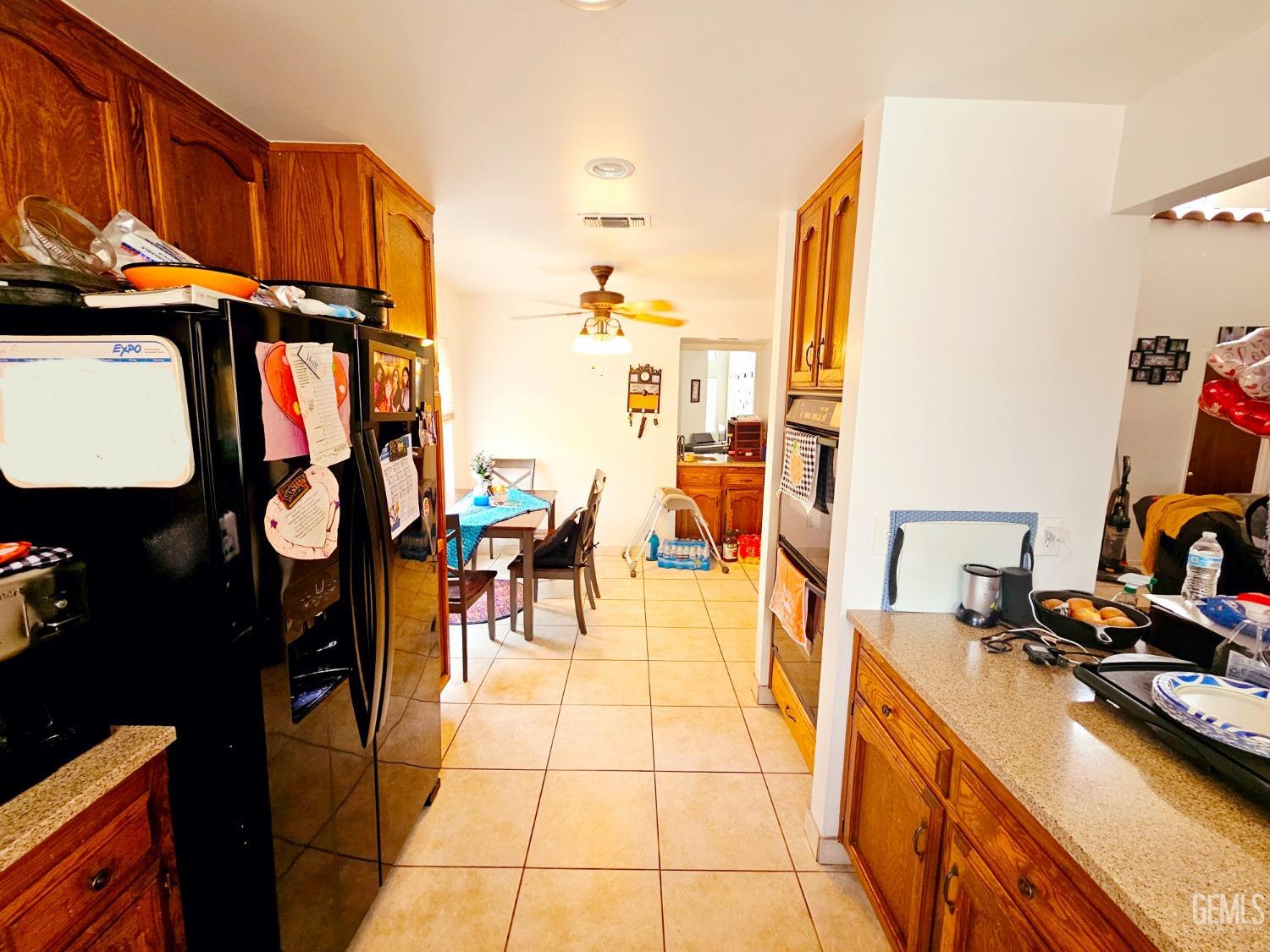 Undisclosed Address Bakersfield, CA 93309 - Photo 10 of 28 a view of a living room and bathroom