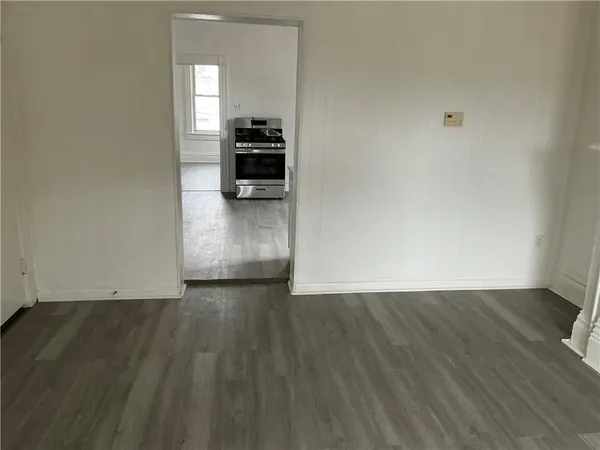 a view of kitchen with wooden floor