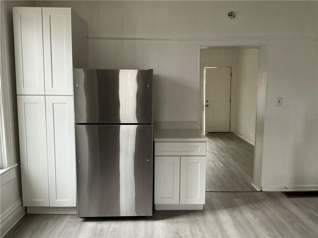 216 Ridge Avenue New Kensington, PA 15068 - Photo 16 of 27 a view of walk in closet with wooden floor