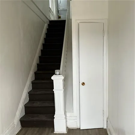 a view of entryway with wooden floor