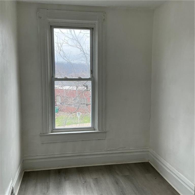 216 Ridge Avenue New Kensington, PA 15068 - Photo 24 of 27 an empty room with a window