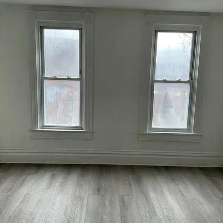 a view of a window in an empty room