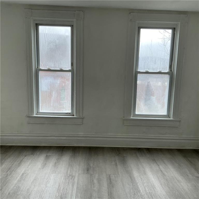 216 Ridge Avenue New Kensington, PA 15068 - Photo 5 of 27 a view of a window in an empty room