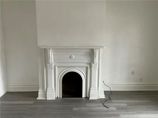 a living room with a fireplace
