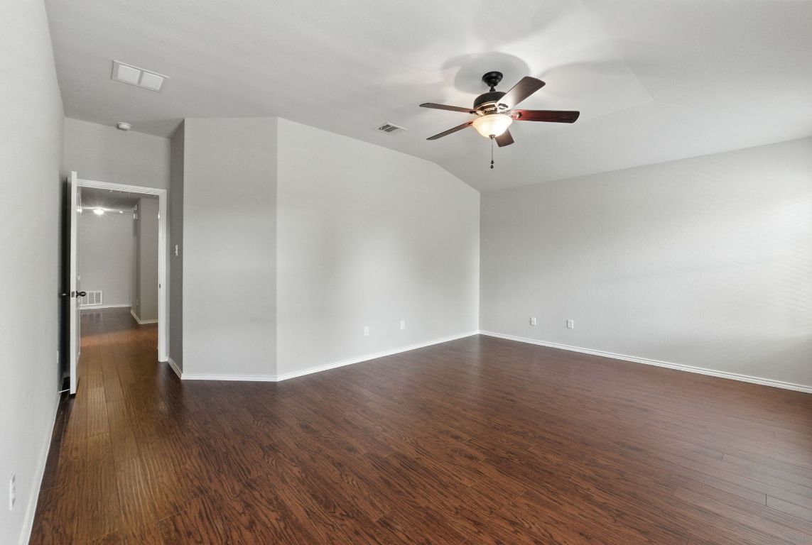 2840 Hearthsong Loop Round Rock, TX 78665 - Photo 29 of 39 a view of empty room with wooden floor