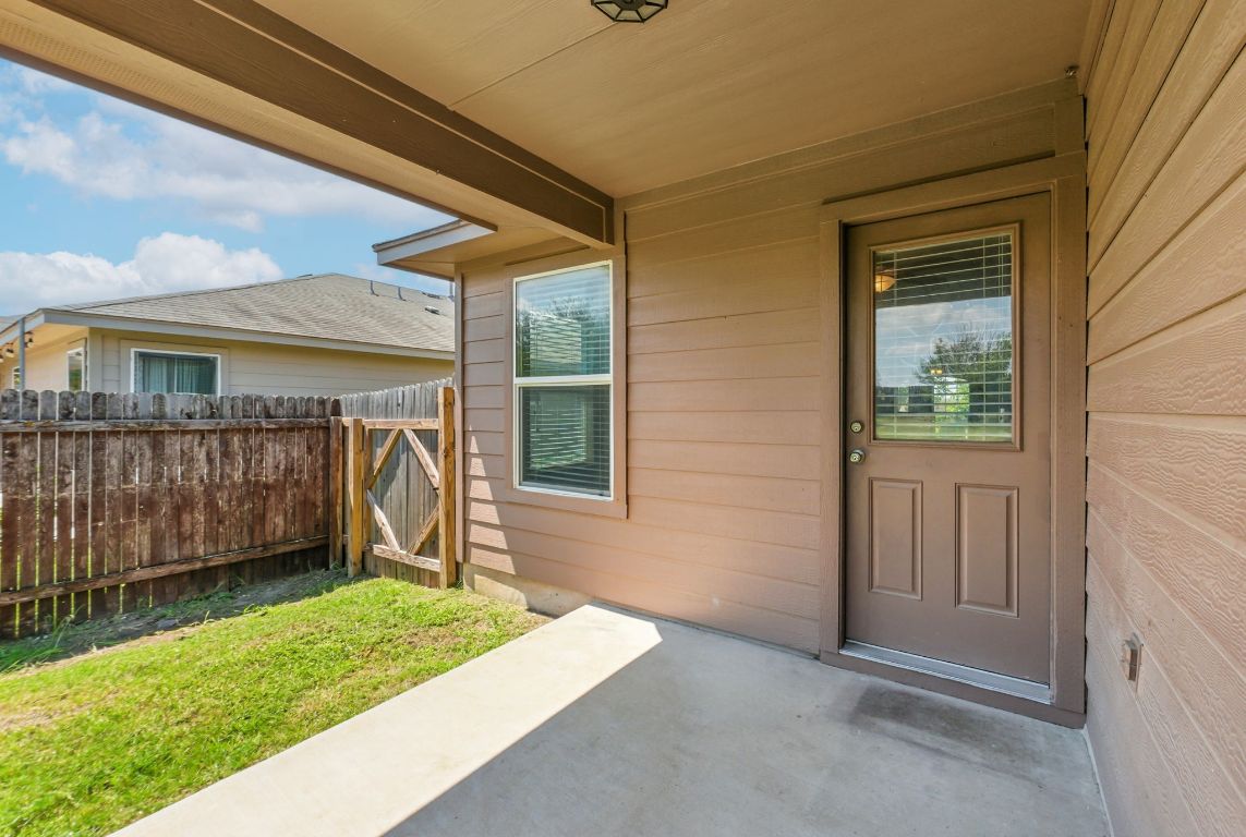 2840 Hearthsong Loop Round Rock, TX 78665 - Photo 34 of 39 a front view of a house with a yard