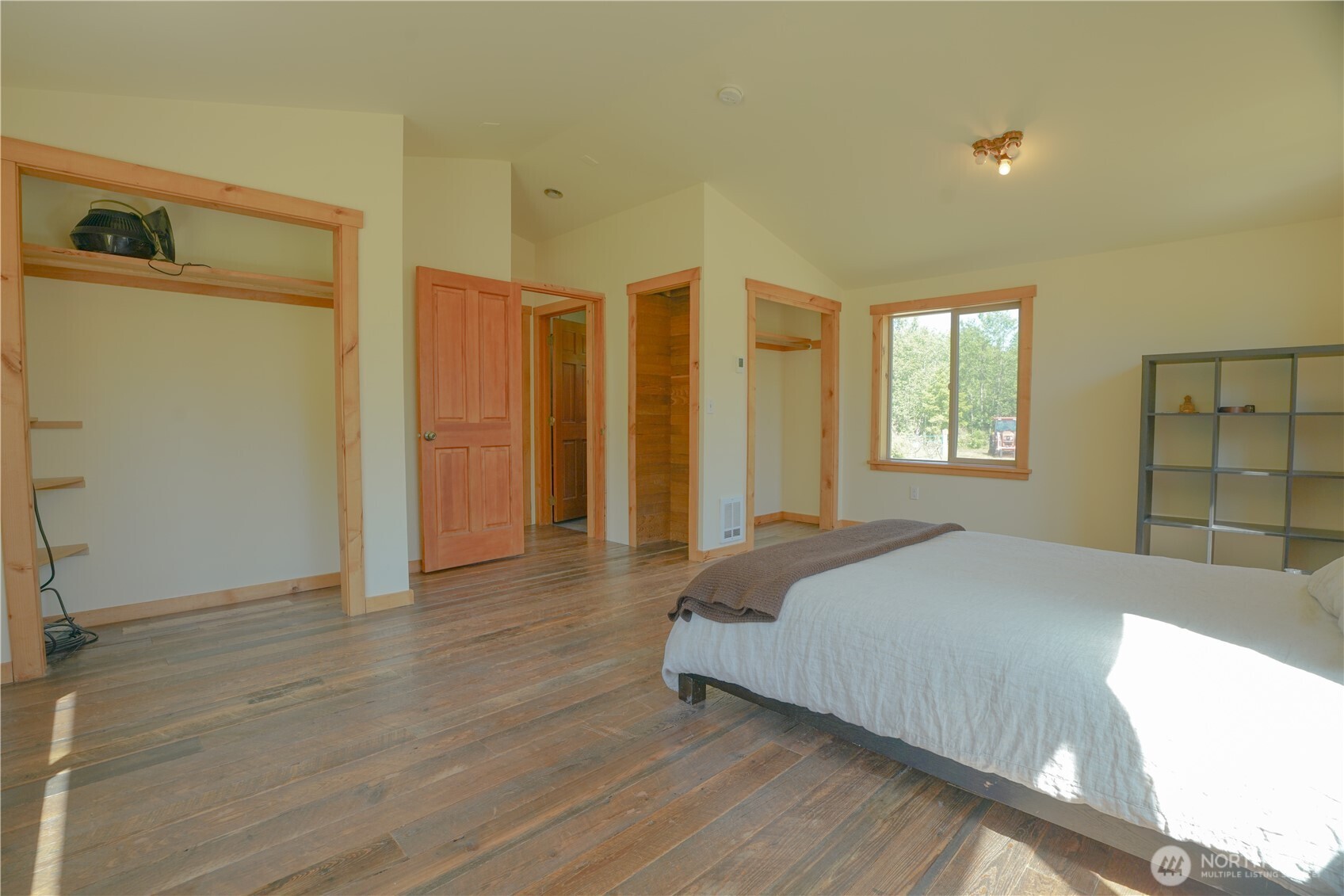 2904 Wildwood Road Quilcene, WA 98376 - Photo 5 of 39 a bedroom with a bed and a window