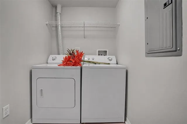 a utility room with dryer and washer