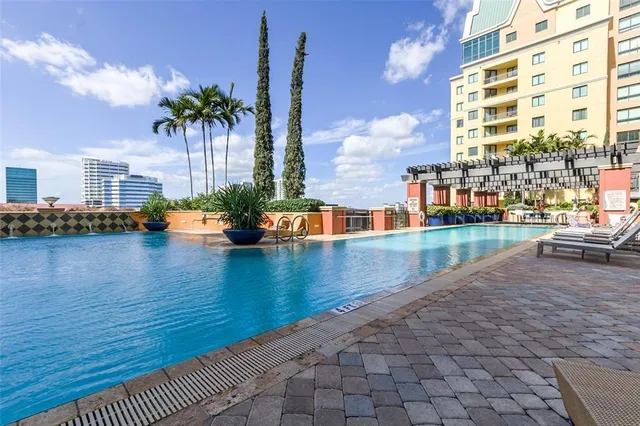 a view of a swimming pool with a patio