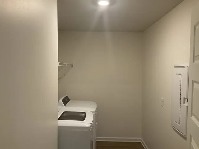 a view of a room with cabinets