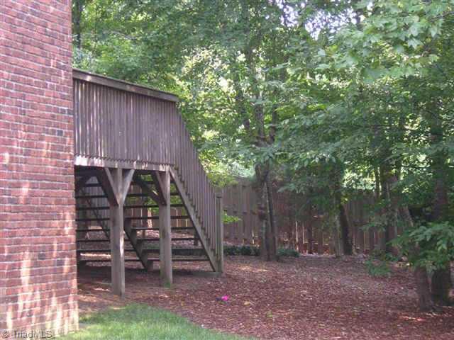 Other. Beautiful & natural back yard with deck & walk-in crawl.