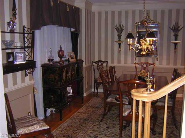 Other. Inviting dining room off foyer, beautiful lighting.