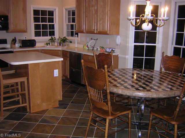 Other. Large kitchen area featuring maple cabinets & amazing Colorado slate flooring. Stainless Fisher & Paykel dishwasher included.