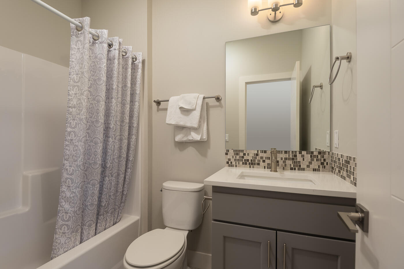 62011 Dantili Road Bend, OR 97701 - Photo 21 of 25 a bathroom with a sink toilet and shower