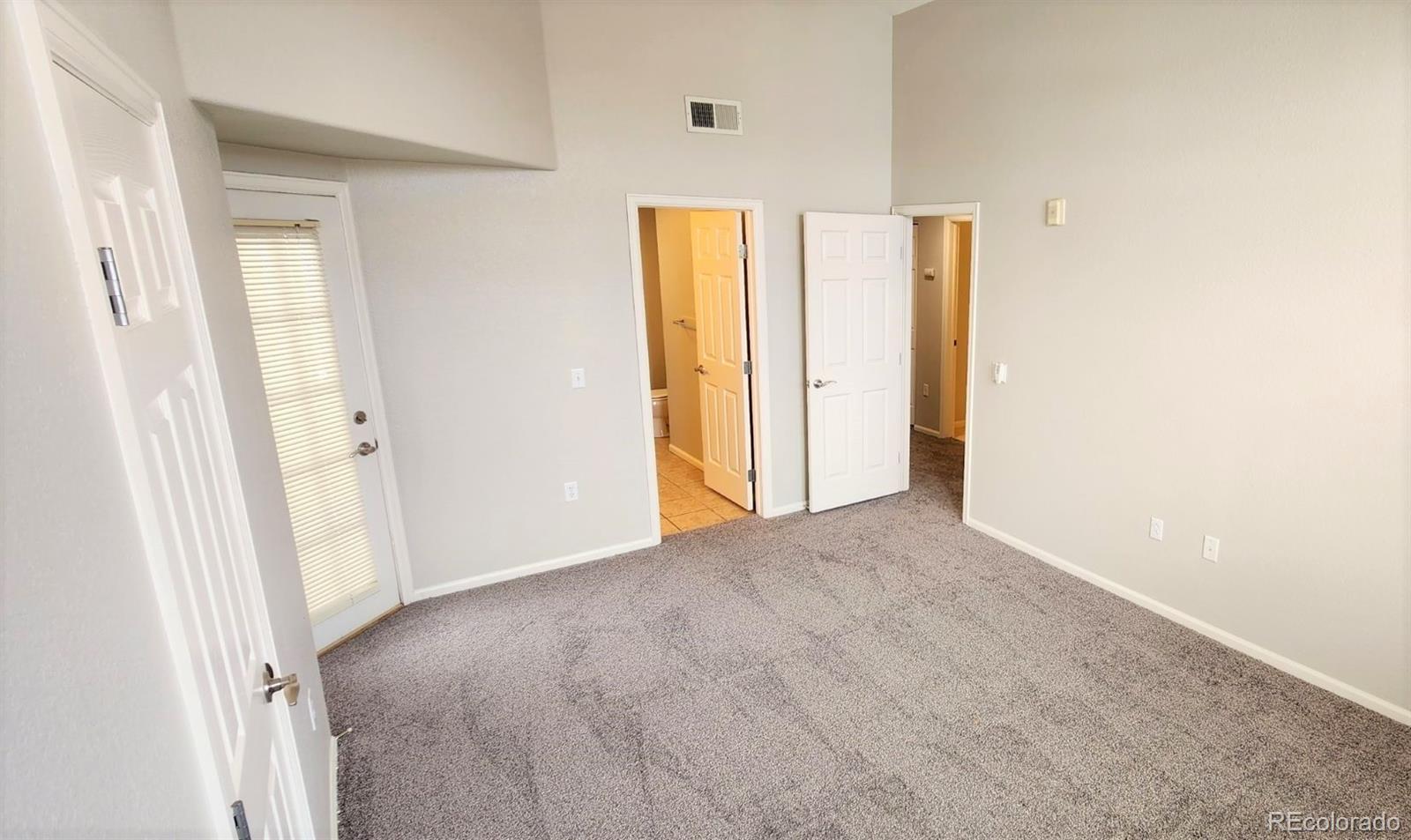 10787 Twenty Mile Road, Unit 305 Parker, CO 80134 - Photo 21 of 28 a view of empty room with windows