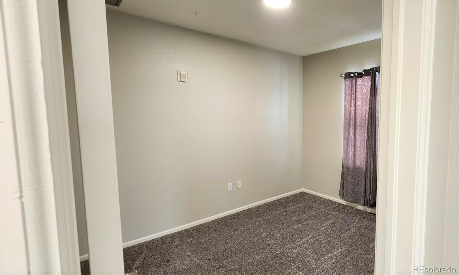 10787 Twenty Mile Road, Unit 305 Parker, CO 80134 - Photo 27 of 28 a view of an empty room